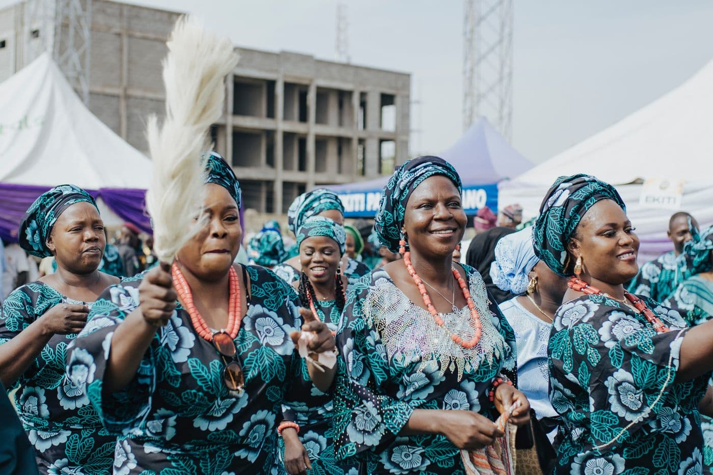 A joyful group of women at a cultural celebration