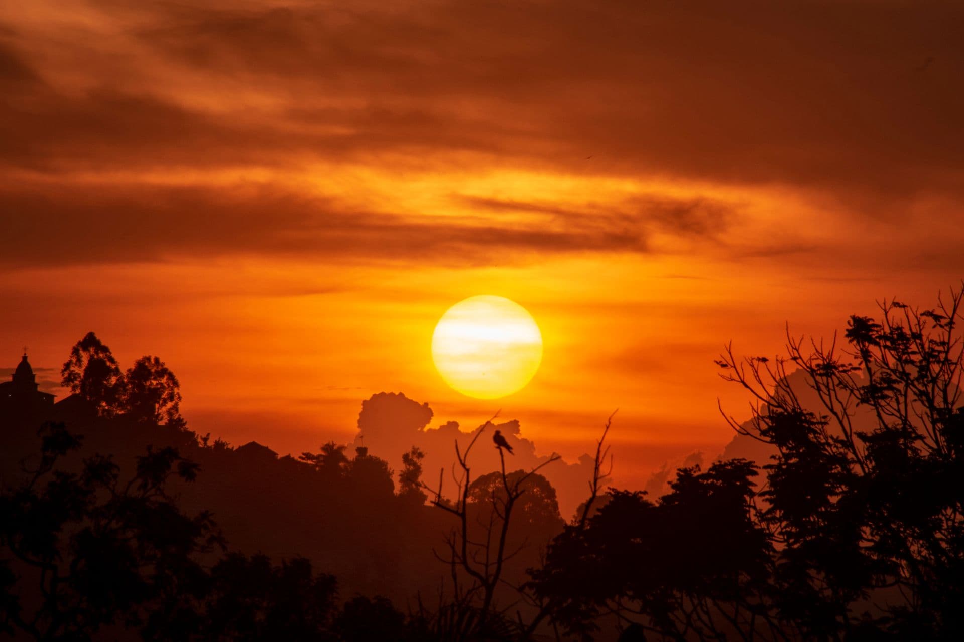 Sunset over Kampala, Uganda, with warm orange skies